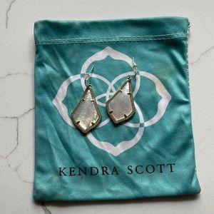 Kendra Scott pearl drop earrings. Like new. Pearl with gold border.